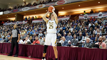 CHARLESTON, SC - NOVEMBER 21: Nicolas Timberlake #25 of the Towson Tigers takes a jump shot during a first round Charleston Classic basketball game against the Xavier Musketeers at the TD Arena on November 21, 2019 in Charleston, South Carolina. (Photo by Mitchell Layton/Getty Images)