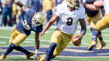 Apr 16, 2016; South Bend, IN, USA; Notre Dame Fighting Irish quarterback Malik Zaire (8) runs for a touchdown in the second quarter of the Blue-Gold Game at Notre Dame Stadium. Mandatory Credit: Matt Cashore-USA TODAY Sports