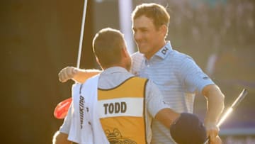PLAYA DEL CARMEN, MEXICO - NOVEMBER 18: Brendon Todd of the United States celebrates with his caddie on the 18th green after winning during the continuation of the final round of the Mayakoba Golf Classic at El Camaleon Mayakoba Golf Course on November 18, 2019 in Playa del Carmen, Mexico. (Photo by Cliff Hawkins/Getty Images)