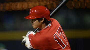 Mar 17, 2021; Peoria, Arizona, USA; Los Angeles Angels designated hitter Shohei Ohtani (17) bats against the Seattle Mariners during the second inning of a spring training game at Peoria Sports Complex. Mandatory Credit: Joe Camporeale-USA TODAY Sports