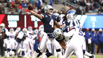 EAST RUTHERFORD, NEW JERSEY - DECEMBER 10: Dak Prescott #4 of the Dallas Cowboys looks to throw a pass against the New York Giants during the third quarter in the game at MetLife Stadium on December 10, 2017 in East Rutherford, New Jersey. (Photo by Elsa/Getty Images)