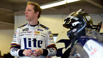 DAYTONA BEACH, FLORIDA - JULY 04: Brad Keselowski, driver of the #2 Miller Lite Ford, stands in the garage area during practice for the Monster Energy NASCAR Cup Series Coke Zero Sugar 400 at Daytona International Speedway on July 04, 2019 in Daytona Beach, Florida. (Photo by Jared C. Tilton/Getty Images)