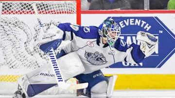 LAVAL, QC, CANADA - MARCH 13: Eddie Pasquale of the Syracuse Crunch makes save during a match against the Laval Rocket at Place Bell on March 13, 2019 in Laval, Quebec. (Photo by Stephane Dube/Getty Images)