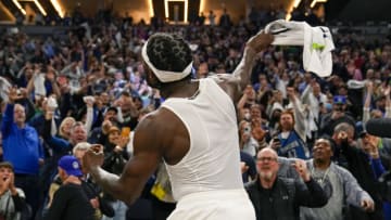 Apr 12, 2022; Minneapolis, Minnesota, USA; Minnesota Timberwolves guard Patrick Beverley (22) throws his jersey into the crowd after the Timberwolves secured a play-off spot by defeating the Los Angeles Clippers in a play-in game at Target Center. Mandatory Credit: Nick Wosika-USA TODAY Sports