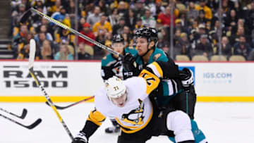 PITTSBURGH, PA - DECEMBER 17: Anaheim Ducks Defenseman Hampus Lindholm (47) checks Pittsburgh Penguins Center Evgeni Malkin (71) off the puck during the first period in the NHL game between the Pittsburgh Penguins and the Anaheim Ducks on December 17, 2018, at PPG Paints Arena in Pittsburgh, PA. (Photo by Jeanine Leech/Icon Sportswire via Getty Images)