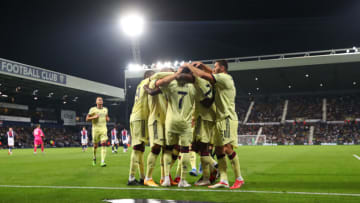 WEST BROMWICH, ENGLAND - AUGUST 25: Bukayo Saka of Arsenal celebrates with his team mates after scoring the fourth goal during the Carabao Cup Second Round between West Bromwich Albion and Arsenal at The Hawthorns on August 25, 2021 in West Bromwich, England. (Photo by Catherine Ivill/Getty Images)