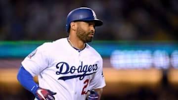 LOS ANGELES, CA - SEPTEMBER 19: Matt Kemp #27 of the Los Angeles Dodgers trots to first base after his solo hoomerun, to trail 2-1, during the second inning at Dodger Stadium on September 19, 2018 in Los Angeles, California. (Photo by Harry How/Getty Images)