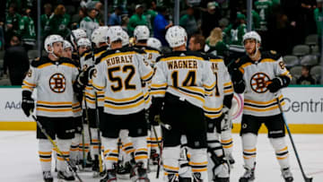 DALLAS, TX - OCTOBER 03: The Boston Bruins celebrate a victory after winning the game between the Dallas Stars and the Boston Bruins on October 03, 2019 at American Airlines Center in Dallas, Texas. (Photo by Matthew Pearce/Icon Sportswire via Getty Images)