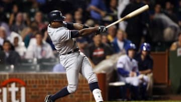 May 20, 2014; Chicago, IL, USA; New York Yankees outfielder Alfonso Soriano at bat against the Chicago Cubs during the game at Wrigley Field. Mandatory Credit: Jerry Lai-USA TODAY Sports