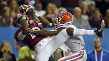 Dec 5, 2015; Atlanta, GA, USA; Alabama Crimson Tide wide receiver ArDarius Stewart (13) makes a touchdown catch against Florida Gators defensive back Vernon Hargreaves III (1) during the third quarter of the 2015 SEC Championship Game at the Georgia Dome. Mandatory Credit: John David Mercer-USA TODAY Sports