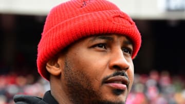 ATHENS, GA - NOVEMBER 24: NBA free agent Carmelo Anthony watches play from the sidelines between the Georgia Bulldogs and the Georgia Tech Yellow Jackets on November 24, 2018 at Sanford Stadium in Athens, Georgia. (Photo by Scott Cunningham/Getty Images)