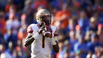 GAINESVILLE, FL - NOVEMBER 25: James Blackman #1 of the Florida State Seminoles looks to pass during the game against the Florida Gators at Ben Hill Griffin Stadium on November 25, 2017 in Gainesville, Florida. (Photo by Rob Foldy/Getty Images)