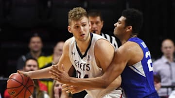 LAS VEGAS, NV - MARCH 05: Jock Landale #34 of the Saint Mary's Gaels is guarded by Yoeli Childs #23 of the Brigham Young Cougars during a semifinal game of the West Coast Conference basketball tournament at the Orleans Arena on March 5, 2018 in Las Vegas, Nevada. The Cougars won 85-72. (Photo by Ethan Miller/Getty Images)