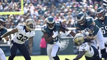 Oct 11, 2015; Philadelphia, PA, USA; Philadelphia Eagles running back DeMarco Murray (29) runs past New Orleans Saints strong safety Kenny Vaccaro (32) and linebacker Dannell Ellerbe (59) during the first quarter at Lincoln Financial Field. Mandatory Credit: Eric Hartline-USA TODAY Sports