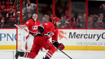 RALEIGH, NC - APRIL 7: Jaccob Slavin #74 of the Carolina Hurricanes skates hard on the ice during an NHL game against the Tampa Bay Lightning on April 7, 2018 at PNC Arena in Raleigh, North Carolina. (Photo by Gregg Forwerck/NHLI via Getty Images)