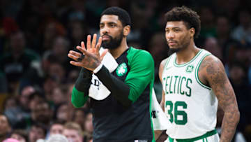 BOSTON, MA - MARCH 29: Kyrie Irving #11 and Marcus Smart #36 of the Boston Celtics react on the bench during the game against the Indiana Pacers at TD Garden on March 29, 2019 in Boston, Massachusetts. NOTE TO USER: User expressly acknowledges and agrees that, by downloading and or using this photograph, User is consenting to the terms and conditions of the Getty Images License Agreement. (Photo by Kathryn Riley/Getty Images)