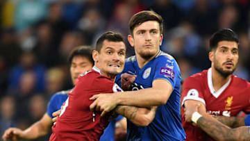 LEICESTER, ENGLAND - SEPTEMBER 23: Dejan Lovren of Liverpool and Harry Maguire of Leicester City in action during the Premier League match between Leicester City and Liverpool at The King Power Stadium on September 23, 2017 in Leicester, England. (Photo by Laurence Griffiths/Getty Images)