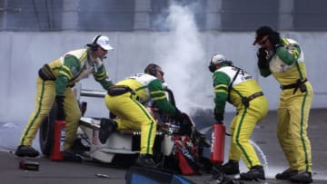 KLETTWIZ, BRANDENBURG - SEPTEMBER 15: Members of the Simple Green Safety team arrive to assist the injured Alessandro Zanardi in the