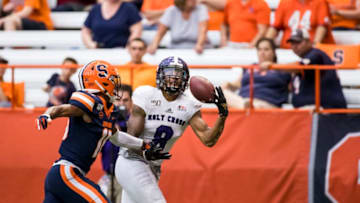SYRACUSE, NY - SEPTEMBER 28: Tenio Ayeni #8 of the Holy Cross Crusaders fails to catch a pass while being defended by Carl Jones #16 of the Syracuse Orange during the fourth quarter at the Carrier Dome on September 28, 2019 in Syracuse, New York. Syracuse defeats Holy Cross 41-3. (Photo by Brett Carlsen/Getty Images)