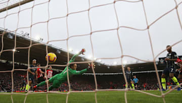 SOUTHAMPTON, ENGLAND - DECEMBER 30: David Silva of Manchester City (C) scores his team's first goal past Alex McCarthy of Southampton during the Premier League match between Southampton FC and Manchester City at St Mary's Stadium on December 29, 2018 in Southampton, United Kingdom. (Photo by Catherine Ivill/Getty Images)