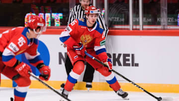 Russia's Alexander Romanov (C-R) vies for the puck during Beijer Hockey Games between Russia and Czech Republic in the Ericson Globe Arena in Stockholm, Sweden, on February 9, 2020. (Photo by Erik SIMANDER / TT News Agency / AFP) / Sweden OUT (Photo by ERIK SIMANDER/TT News Agency/AFP via Getty Images)