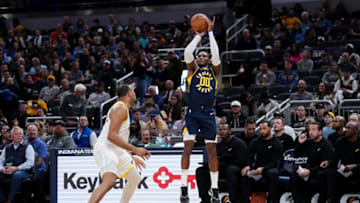 INDIANAPOLIS, INDIANA - NOVEMBER 08: Bennedict Mathurin #00 of the Indiana Pacers attempts a shot while being guarded by Talen Horton-Tucker #5 of the Utah Jazz in the second quarter at Gainbridge Fieldhouse on November 08, 2023 in Indianapolis, Indiana. NOTE TO USER: User expressly acknowledges and agrees that, by downloading and or using this photograph, User is consenting to the terms and conditions of the Getty Images License Agreement. (Photo by Dylan Buell/Getty Images)