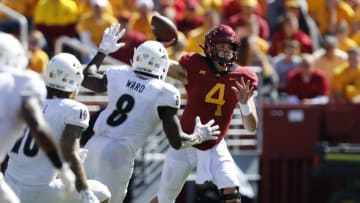 AMES, IA - SEPTEMBER 22: Quarterback Zeb Noland #4 of the Iowa State Cyclones throws under pressure from linebacker Brian Bell #10, and linebacker Josh Ward #8 of the Akron Zips in the second half of play at Jack Trice Stadium on September 22, 2018 in Ames, Iowa. The Iowa State Cyclones won 26-13 over the Akron Zips. (Photo by David Purdy/Getty Images)