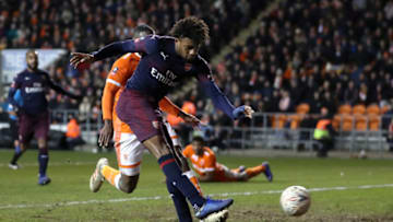 BLACKPOOL, ENGLAND - JANUARY 05: Alex Iwobi of Arsenal scores his team's third goal during the FA Cup Third Round match between Blackpool and Arsenal at Bloomfield Road on January 5, 2019 in Blackpool, United Kingdom. (Photo by Mark Robinson/Getty Images)