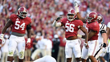 Oct 22, 2016; Tuscaloosa, AL, USA; Alabama Crimson Tide linebacker Tim Williams (56) celebrates his sack with defensive lineman Jonathan Allen (93) on Texas A&M Aggies quarterback Trevor Knight (8) during the third quarter at Bryant-Denny Stadium. Mandatory Credit: John David Mercer-USA TODAY Sports