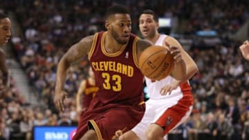 Feb 21, 2014; Toronto, Ontario, CAN; Cleveland Cavaliers forward Alonzo Gee (33) dribbles the ball against the Toronto Raptors at Air Canada Centre. The Raptors won 98-91. Mandatory Credit: Tom Szczerbowski-USA TODAY Sports