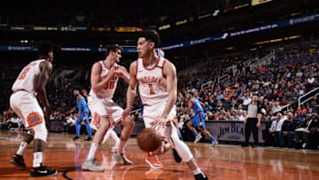 PHOENIX, AZ - MARCH 2: Devin Booker #1 of the Phoenix Suns handles the ball against the Oklahoma City Thunder on March 2, 2018 at Talking Stick Resort Arena in Phoenix, Arizona. NOTE TO USER: User expressly acknowledges and agrees that, by downloading and or using this photograph, user is consenting to the terms and conditions of the Getty Images License Agreement. Mandatory Copyright Notice: Copyright 2018 NBAE (Photo by Michael Gonzales/NBAE via Getty Images)