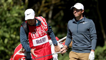 SOUTHPORT, ENGLAND - JULY 20: Rory McIlroy of Northern Ireland looks dejected as he hands the club to his caddie JP Fitzgerald on the 5th hole during the first round of the 146th Open Championship at Royal Birkdale on July 20, 2017 in Southport, England. (Photo by Christian Petersen/Getty Images)