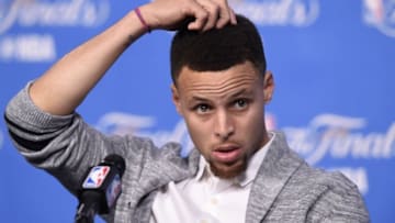 Jun 16, 2016; Cleveland, OH, USA; Golden State Warriors guard Stephen Curry (30) speaks to the media after game six of the NBA Finals against the Cleveland Cavaliers at Quicken Loans Arena. The Cavaliers won 115-101. Mandatory Credit: David Richard-USA TODAY Sports