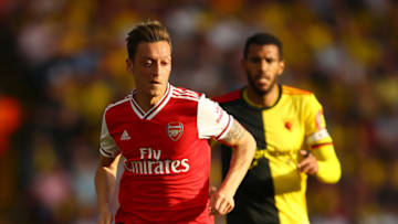 WATFORD, ENGLAND - SEPTEMBER 15: Mesut Ozil of Arsenal runs with the the ball during the Premier League match between Watford FC and Arsenal FC at Vicarage Road on September 15, 2019 in Watford, United Kingdom. (Photo by Julian Finney/Getty Images)