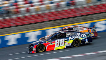 CHARLOTTE, NC - MAY 19: Alex Bowman, driver of the #88 Axalta Chevrolet, and Chase Elliott, driver of the #9 SunEnergy1 Chevrolet, race during the Monster Energy NASCAR Cup Series All-Star Race Open at Charlotte Motor Speedway on May 19, 2018 in Charlotte, North Carolina. (Photo by Brian Lawdermilk/Getty Images)