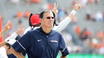 CHARLOTTESVILLE, VA - SEPTEMBER 16: Head coach Randy Edsall of the Connecticut Huskies watches a replay during a game against the Virginia Cavaliers at Scott Stadium on September 16, 2017 in Charlottesville, Virginia. (Photo by Ryan M. Kelly/Getty Images)