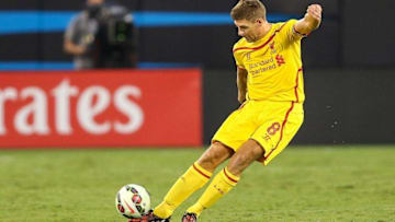 Aug 2, 2014; Charlotte, NC, USA; Liverpool midfielder Steven Gerrard (8) kicks the ball during an international friendly against AC Milan at Bank of America Stadium. Mandatory Credit: Jim Dedmon-USA TODAY Sports