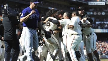 May 25, 2013; San Francisco, CA, USA; San Francisco Giants center fielder Angel Pagan (16) in middle, celebrates with Giants team after hitting an inside-the-park homerun in the bottom of the tenth inning against the Colorado Rockies at AT