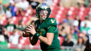 TAMPA, FLORIDA - NOVEMBER 03: Blake Barnett #11 of the South Florida Bulls drops back for a pass during the second quarter against the Tulane Green Wave at Raymond James Stadium on November 03, 2018 in Tampa, Florida. (Photo by Julio Aguilar/Getty Images)
