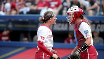 Oklahoma's Jordy Bahl (98) and Kinzie Hansen (9) celebrate after an out during a softball game between University of Oklahoma Sooners (OU) and Stanford in the Women's College World Series at USA Softball Hall of Fame Stadium in Oklahoma City, Thursday, June 1, 2023. Oklahoma won 2-0.