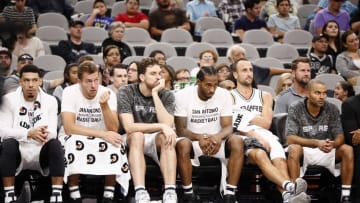 Oct 14, 2016; San Antonio, TX, USA; San Antonio Spurs players (left to right) Danny Green (14), along with David Lee (10) and Pau Gasol (16) and Kawhi Leonard (2) and Manu Ginobili (20) and Tony Parker (9) watch on the bench during the second half against the Miami Heat at AT&T Center. Mandatory Credit: Soobum Im-USA TODAY Sports