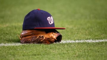 Aug 1, 2016; Phoenix, AZ, USA; Detailed view of a Washington Nationals hat and baseball glove against the Arizona Diamondbacks at Chase Field. Mandatory Credit: Mark J. Rebilas-USA TODAY Sports