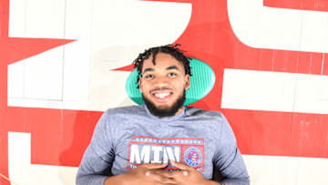DETROIT, MI - NOVEMBER 11: Karl-Anthony Towns #32 of the Minnesota Timberwolves smiles before the game against the Detroit Pistons on November 11, 2019 at Little Caesars Arena in Detroit, Michigan. NOTE TO USER: User expressly acknowledges and agrees that, by downloading and/or using this photograph, User is consenting to the terms and conditions of the Getty Images License Agreement. Mandatory Copyright Notice: Copyright 2019 NBAE (Photo by Chris Schwegler/NBAE via Getty Images)