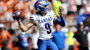 AUSTIN, TEXAS - SEPTEMBER 30: Jason Bean #9 of the Kansas Jayhawks throws a pass in the first quarter against the Texas Longhorns at Darrell K Royal-Texas Memorial Stadium on September 30, 2023 in Austin, Texas. (Photo by Tim Warner/Getty Images)