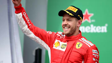 MONTREAL, QC - JUNE 10: Race winner Sebastian Vettel of Germany and Ferrari (Photo by Charles Coates/Getty Images)
