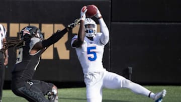 Florida defensive back Kaiir Elam (5) pulls in an interception over Vanderbilt wide receiver Chris Pierce Jr. (19) during the fourth quarter at Vanderbilt Stadium Saturday, Nov. 21, 2020 in Nashville, Tenn.Nas Vandy Florida 031