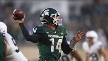 EAST LANSING, MI - NOVEMBER 04: Brian Lewerke #14 of the Michigan State Spartans throws a second half pass while playing the Penn State Nittany Lions at Spartan Stadium on November 4, 2017 in East Lansing, Michigan. Michigan State won the game 27-24. (Photo by Gregory Shamus/Getty Images)