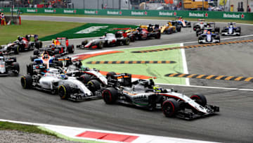 MONZA, ITALY - SEPTEMBER 04: Sergio Perez of Mexico driving the (11) Sahara Force India F1 Team VJM09 Mercedes PU106C Hybrid turbo leads Valtteri Bottas of Finland driving the (77) Williams Martini Racing Williams FW38 Mercedes PU106C Hybrid turbo and Nico Hulkenberg of Germany driving the (27) Sahara Force India F1 Team VJM09 Mercedes PU106C Hybrid turbo on track during the Formula One Grand Prix of Italy at Autodromo di Monza on September 4, 2016 in Monza, Italy. (Photo by Mark Thompson/Getty Images)