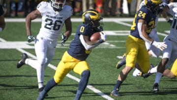 ANN ARBOR, MI - OCTOBER 31: Giles Jackson #0 of the Michigan Wolverines runs the ball during the first quarter against the Michigan State Spartans at Michigan Stadium on October 31, 2020 in Ann Arbor, Michigan. (Photo by Nic Antaya/Getty Images)