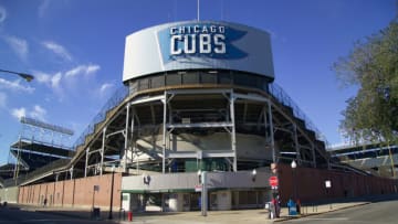 CHICAGO, IL - SEPTEMBER 25: A general view of the back of the historic center field hand-operated scoreboard outside Wrigley Field the home of the Chicago Cubs from the corner of Waveland Avenue and Sheffield Avenue on September 25, 2004 in Chicago, Illinois. (Photo by Tom Szczerbowski/Getty Images)
